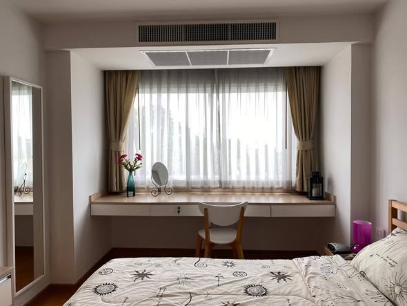 bedroom and bathroom of Residence 52 Condominium