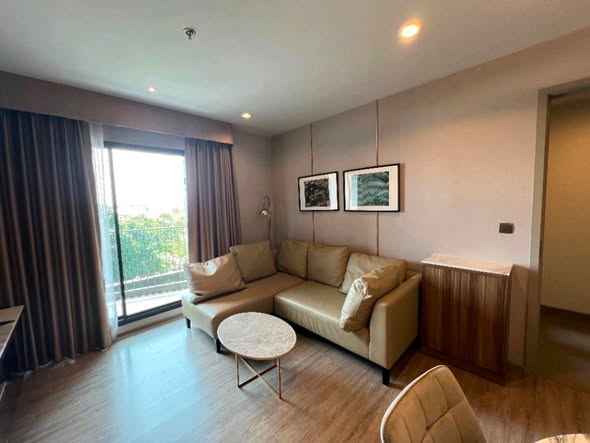 bedroom and living room of Rhythm Ekkamai Estate