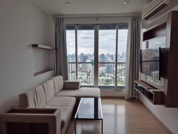 bedroom and living room of RHYTHM Phahon-Ari