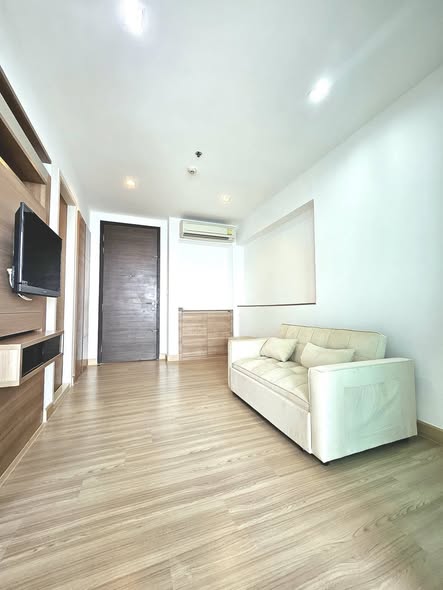 living room and bedroom of RHYTHM Phahon-Ari