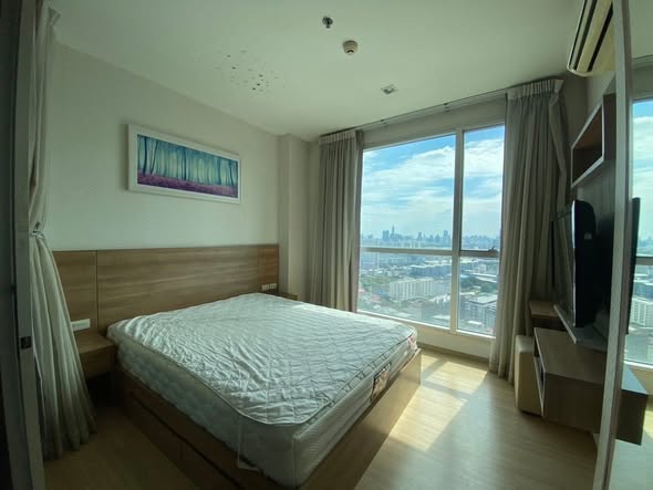 bedroom of RHYTHM Ratchada-Huaykwang