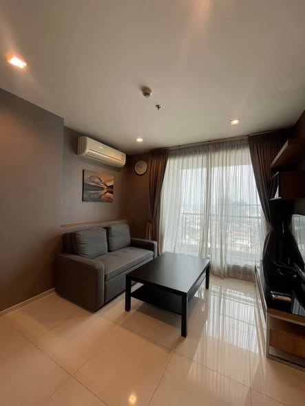 bedroom and living room of RHYTHM Ratchada-Huaykwang