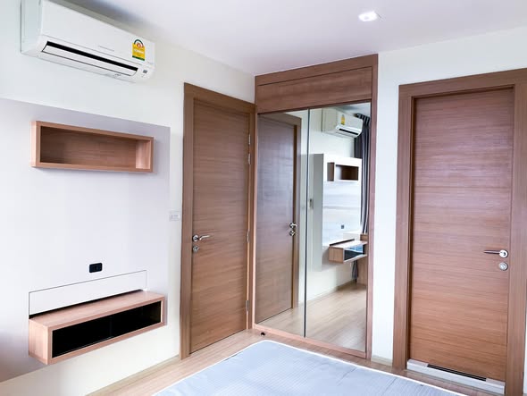 bedroom and room interior of RHYTHM Ratchada-Huaykwang