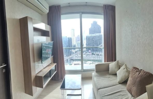 bedroom and living room of RHYTHM Sathorn