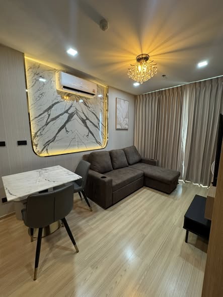 living room and bedroom of RHYTHM Sathorn