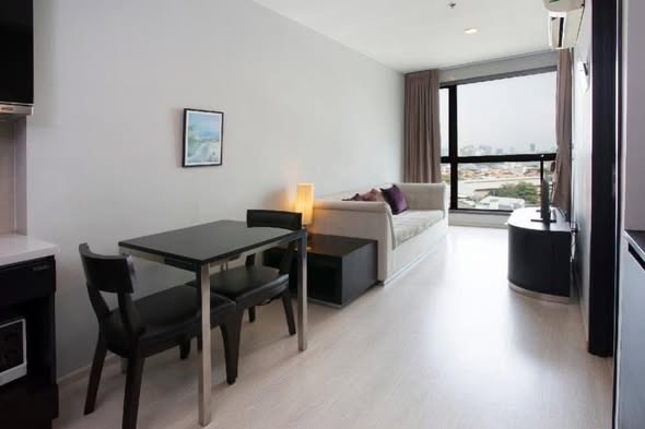bedroom and living room of RHYTHM Sukhumvit 44/1