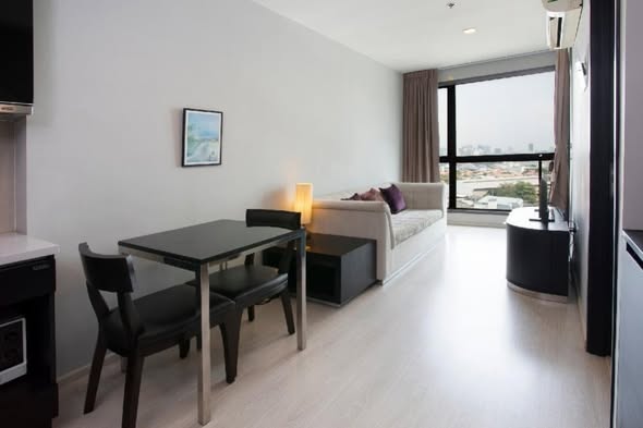 living room and bedroom of RHYTHM Sukhumvit 44/1
