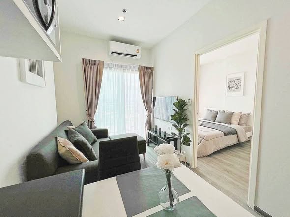 bedroom and living room of Rich Park Triple Station