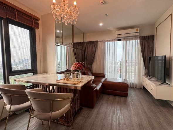 living room and bedroom of Rich Park Triple Station