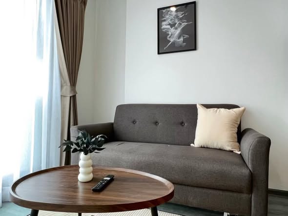 living room and bedroom of Rich Park Triple Station