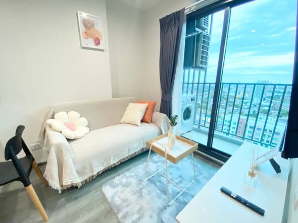 living room and bedroom of Rich Park Triple Station