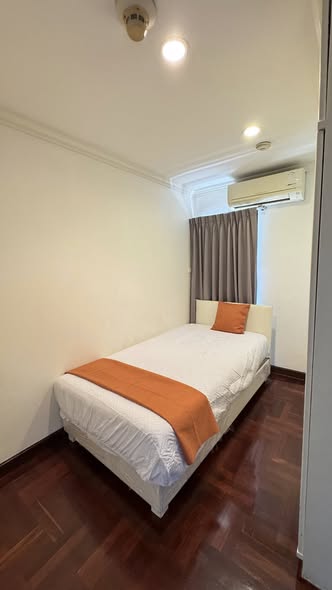 bedroom of Richmond Palace Condominium