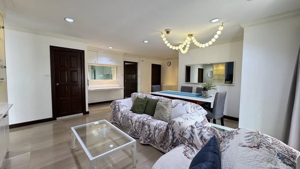 living room and bedroom of Richmond Palace Condominium