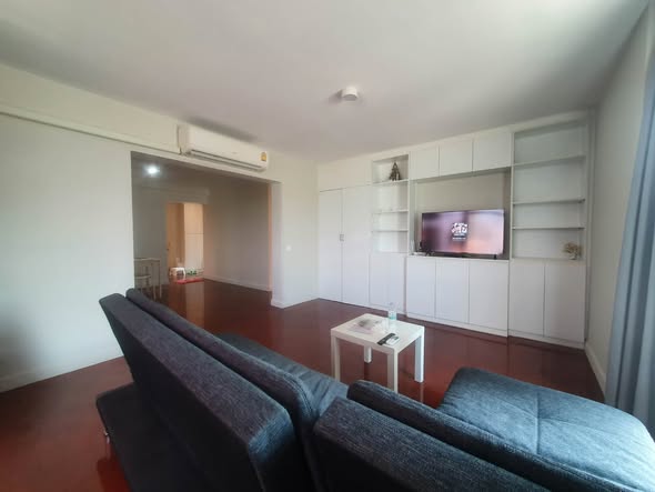 bedroom and living room of Riviera Condominium
