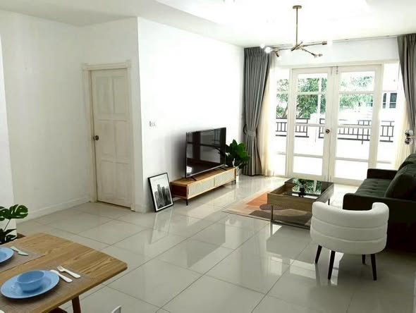 living room and bedroom of Ruen Pisa Village
