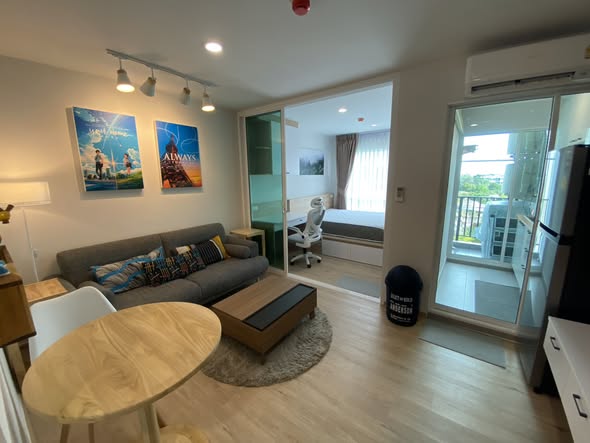 bedroom and living room of RYE Talat Phlu