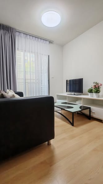 bedroom and living room of S&S Sukhumvit Condominium