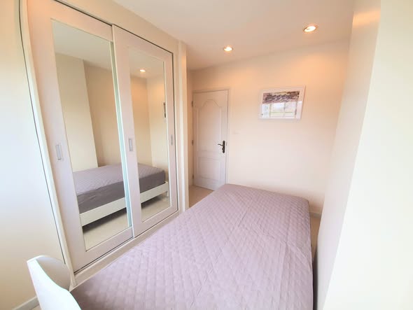 bedroom and room interior of Sense of London Condo