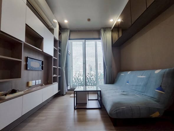 living room and bedroom of Sign Condo Sukhumvit 50