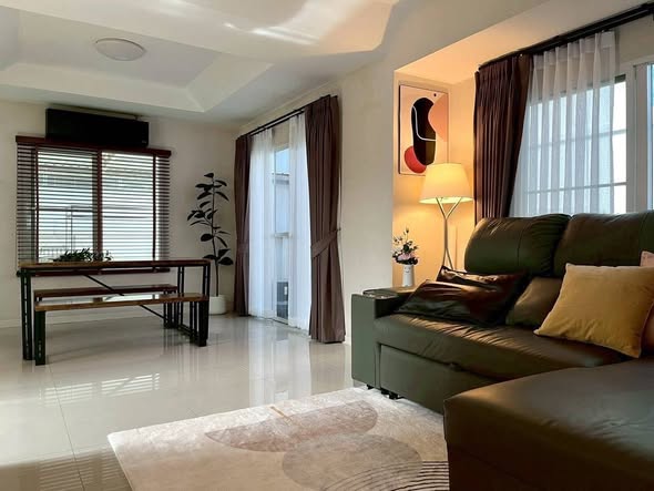 bedroom and living room of Siwalee Suvarnabhumi Village