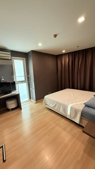 bedroom of Sky Walk Residences