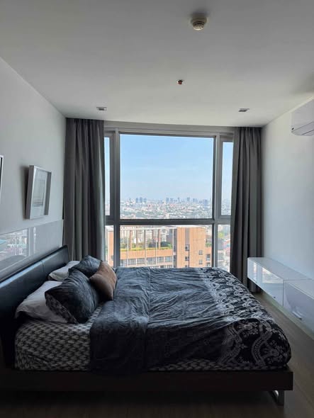bedroom of Sky Walk Residences