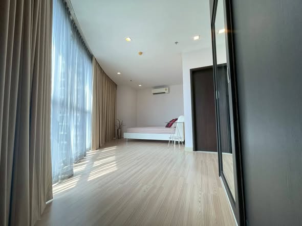 bedroom and room interior of Sky Walk Residences
