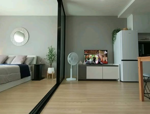 living room and bedroom of Sky Walk Residences