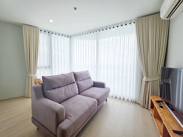 bedroom and living room of Skyrise Avenue Sukhumvit 64