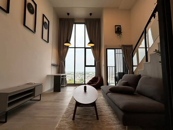 living room and bedroom of SO Origin Phahol 69 Station