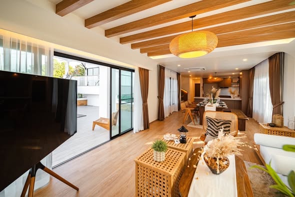 living room of Somkid pool villa loft cafe บ้านพักพูลวิลล่าพัทยา จอมเทียน พัทยาใต้