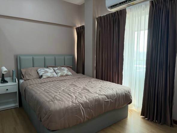 bedroom of Studio One Condo