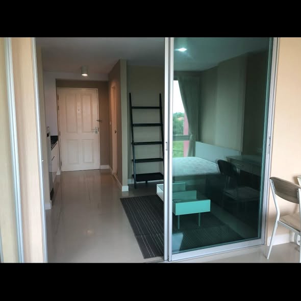 bedroom and room interior of Swift Condo