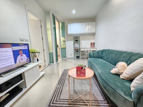 bedroom and living room of TC-Green Condominium