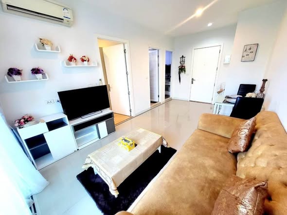bedroom and living room of TC-Green Condominium