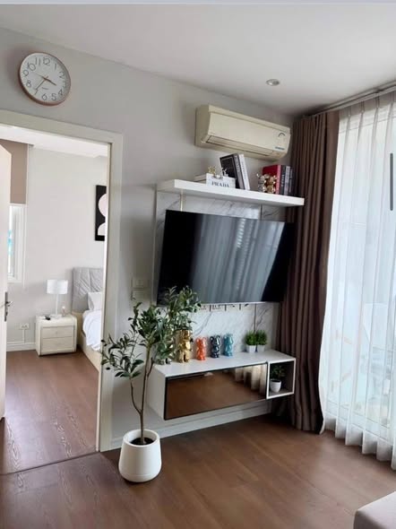 bedroom and living room of TC-Green Condominium