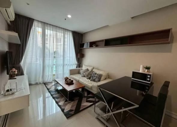 living room and bedroom of TC-Green Condominium