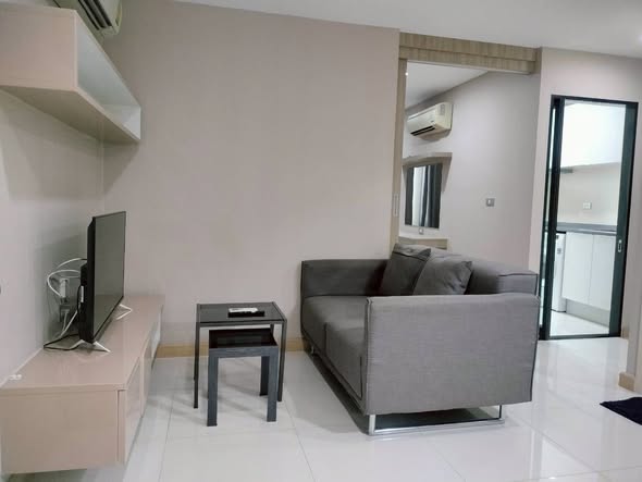 living room and bedroom of THE ACE EKAMAI