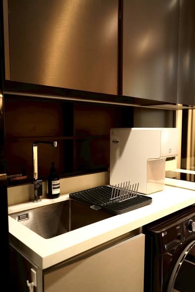 bathroom and kitchen of The Address Siam-Ratchathewi