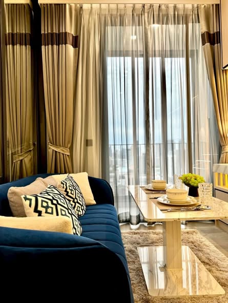 living room and bedroom of The Address Siam-Ratchathewi