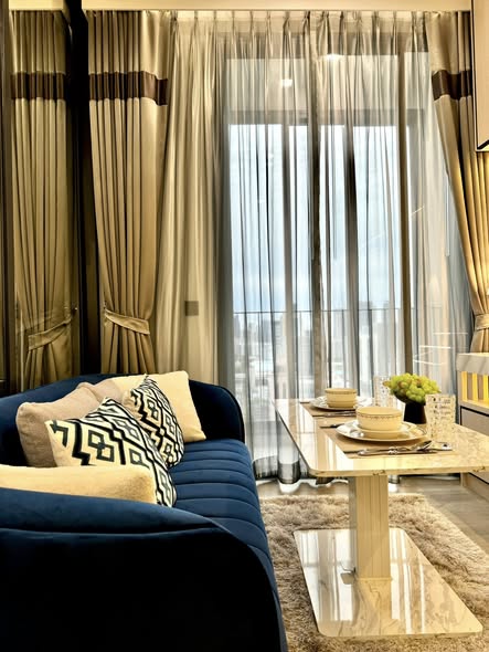 living room and bedroom of The Address Siam-Ratchathewi