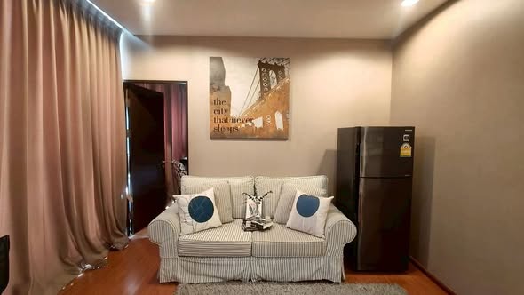 living room and bedroom of The Alcove Thonglor 10