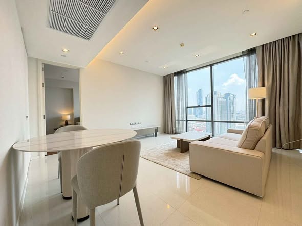 bedroom and living room of The Bangkok Sathorn