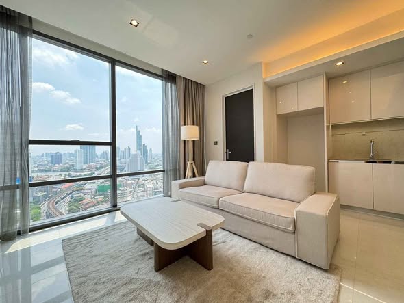 bedroom and living room of The Bangkok Sathorn