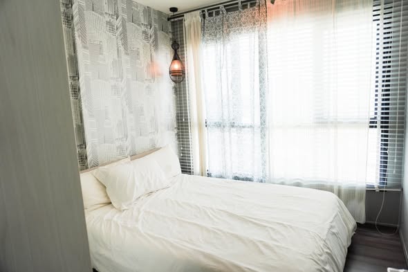 bedroom of THE BASE Park West – Sukhumvit 77