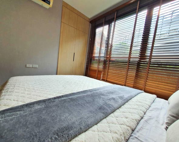 bedroom of THE BASE Park West – Sukhumvit 77
