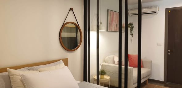 bedroom and room interior of THE BASE Park West – Sukhumvit 77