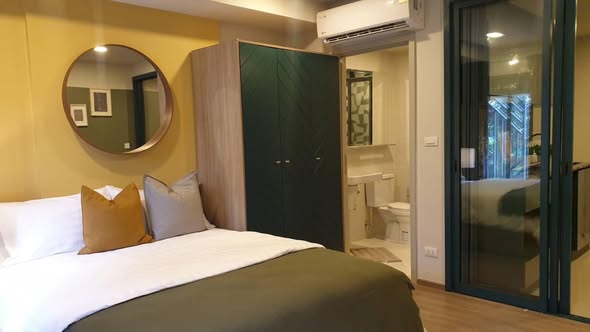 bedroom and room interior of THE BASE Sukhumvit 50
