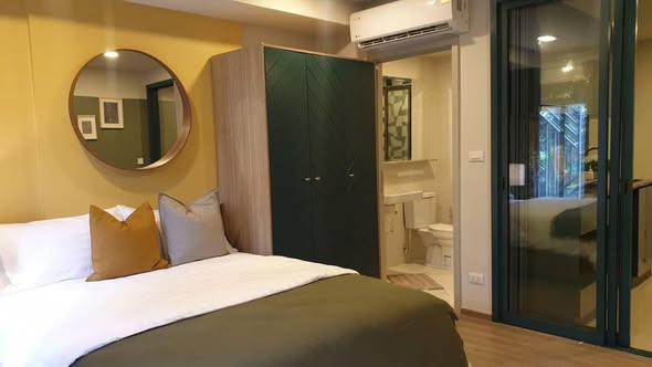 bedroom and room interior of THE BASE Sukhumvit 50