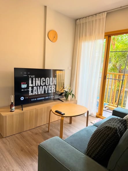 living room of THE BASE Sukhumvit 50
